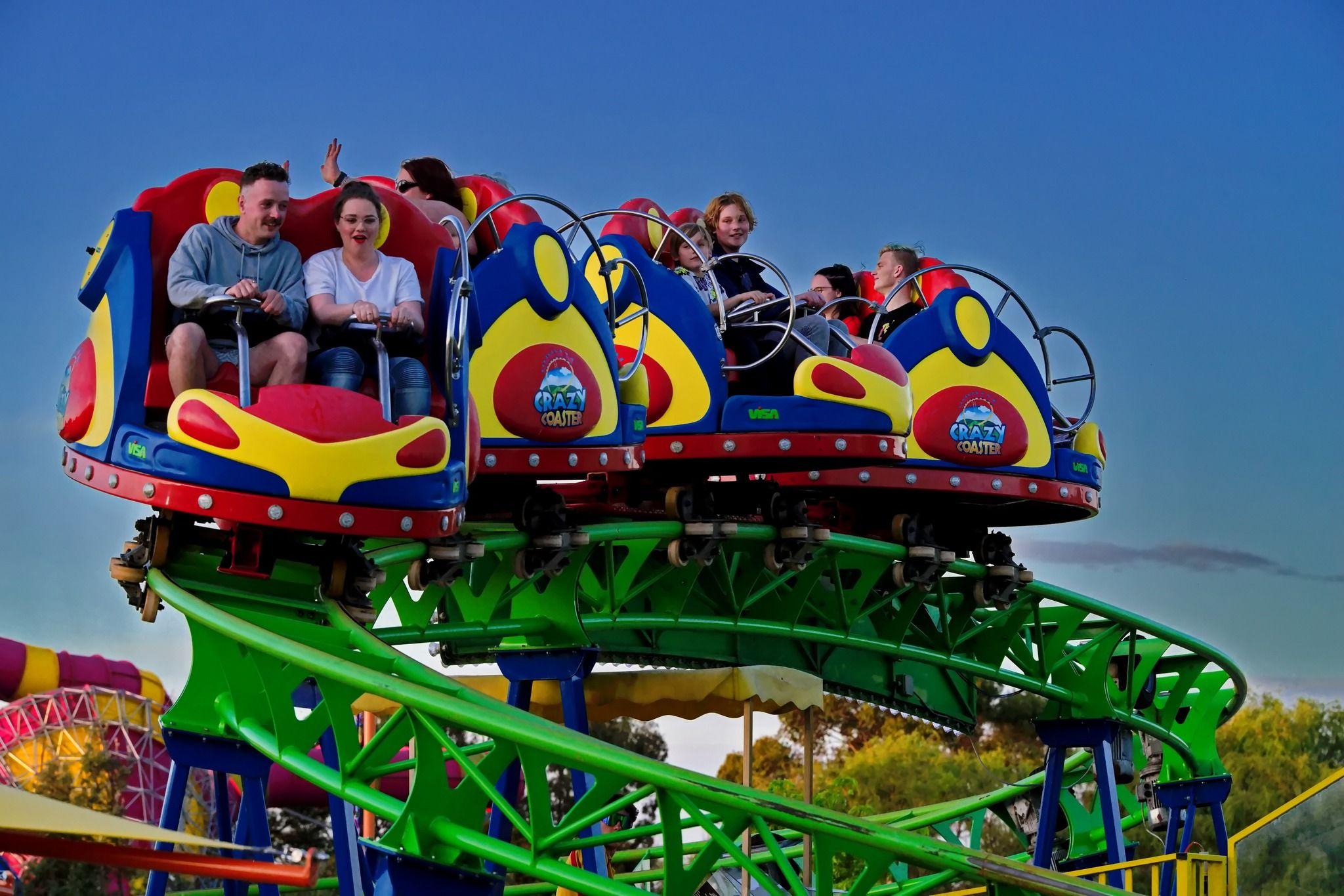 Scream the night away on the Crazy Coaster background